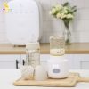 công dụng máy hâm sữa cầm tay mb069